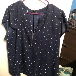 Blue blouse with white arrows